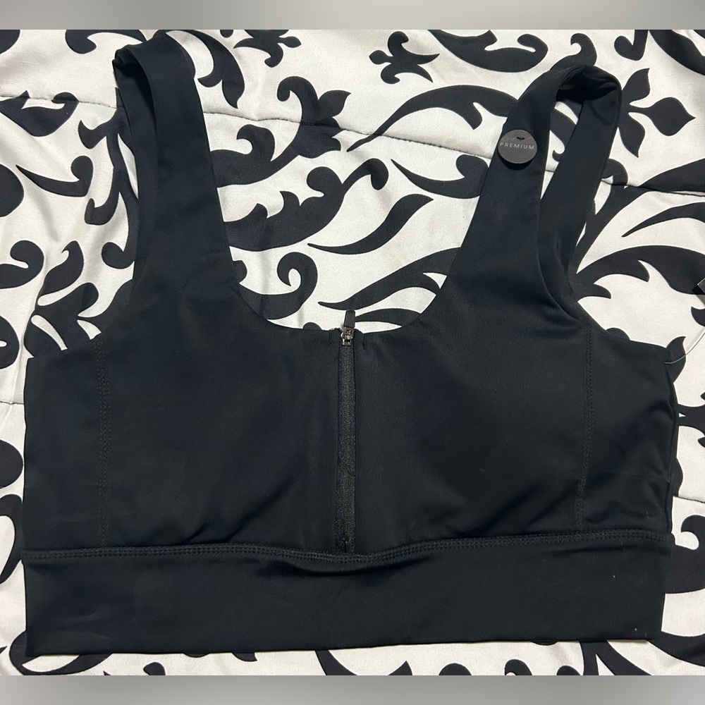NWT- Cotton on body black sports bra- padding&half zip in front- size large